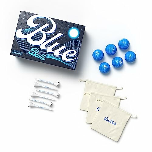 Set of blue golf balls with packaging and accessories.