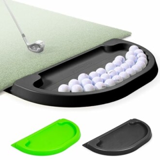 Golf ball tray with multiple balls and golf club mat.