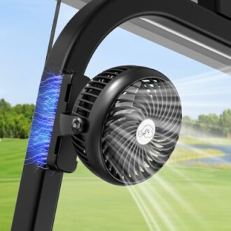 Clip-on fan attached to a golf cart frame.