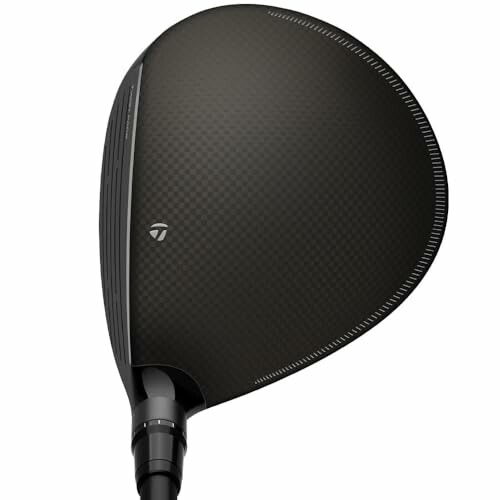 Top view of a golf club head with a carbon fiber pattern.