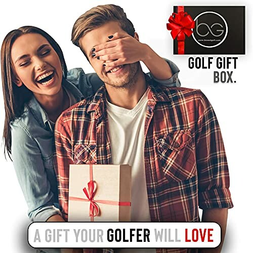 Smiling couple with a golf gift box