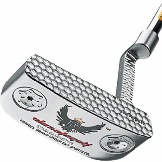 Close-up of a metallic golf putter with textured face and engraved logo.