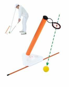 Golf training aid with alignment tool and golfer in action.
