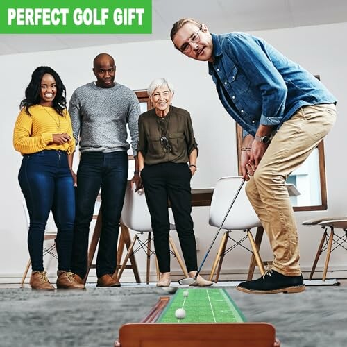 Group of people enjoying an indoor golf putting set.