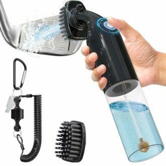 Hand holding a portable dog shower with attachments.