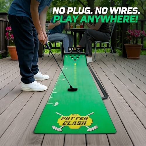 People playing on a portable putting green game on a deck.