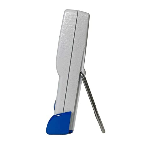 Side view of a digital thermometer with a stand.